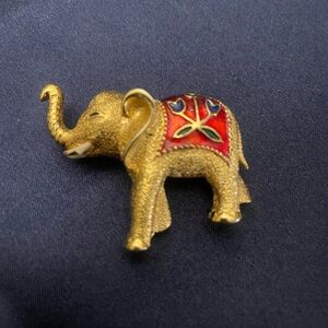 Joel hallmarked 5722 Gold toned Elephant Brooch with Red and Blue Accents